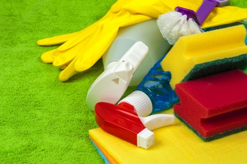 Cleaning operator checking product handling and equipment safety during carpet cleaning
